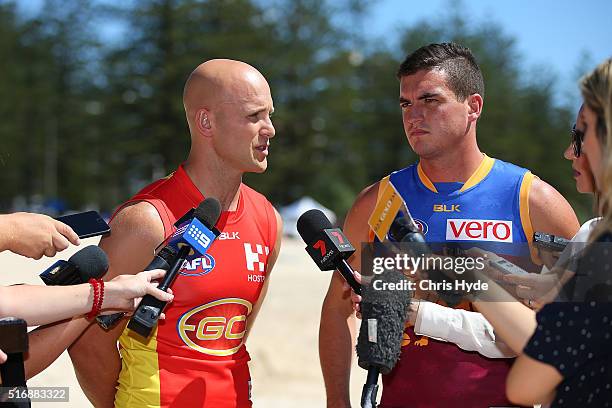 Gold Coast Suns captain Gary Ablett and Brisbane Lions captain Tom Rockliff speak to media during a press conference at Oskars on Burleigh on March...