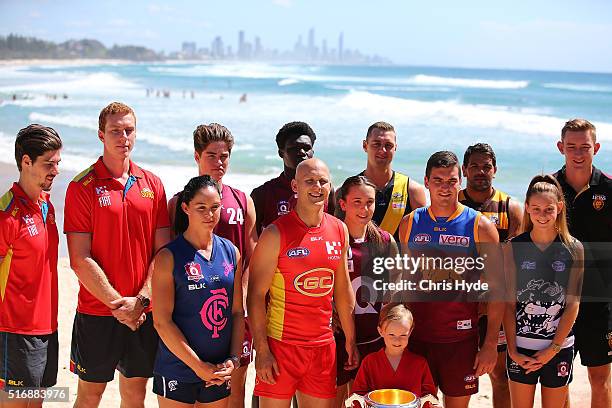 Gold Coast Suns captain Gary Ablett and Brisbane Lions captain Tom Rockliff celebrate Queensland's 150 year anniversary of Australian Rules Football...