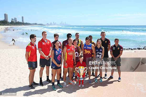 Gold Coast Suns captain Gary Ablett and Brisbane Lions captain Tom Rockliff celebrate Queensland's 150 year anniversary of Australian Rules Football...