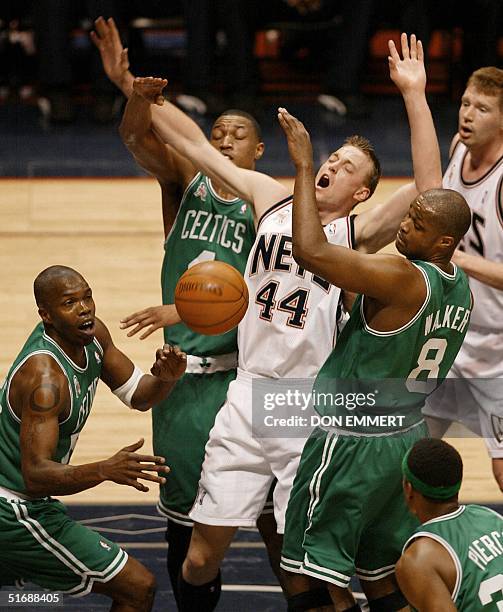 Eric Williams of the Boston Celtics strips the ball from Keith Van Horn of the New Jersey Nets during game two of their NBA Eastern Conference Finals...