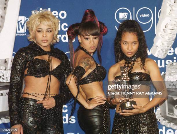 File photo dated 10 September, 1999 shows the all-female group TLC posing with their MTV Video Music Award for Best Group Video for their video "No...