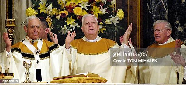 Cardinal Anthony Bevilacqua , Archbishop of Philadelphia, PA; Cardinal Bernard F. Law , Archbishop of Boston, MA; and Cardinal William Keeler ,...