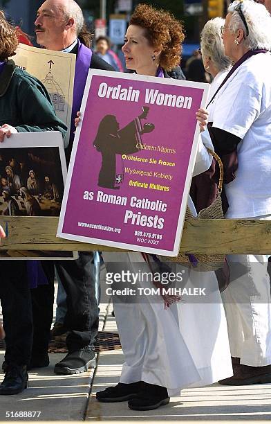 Janice Sevre-Duszynska of Lexington, KY, was one of only a handful of demonstrators gathered near the Cathedral Basilica of Saints Peter and Paul 26...