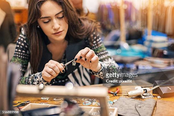 women in arts and crafts - jewelry stock pictures, royalty-free photos & images