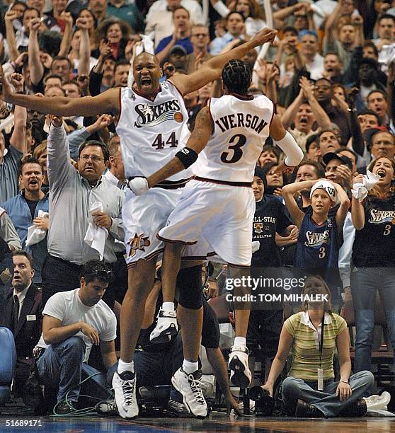Philadelphia 76ers' forward Derrick Coleman and guard Allen Iverson chest-bump in front of thousands of screaming fans after defeating the Boston...