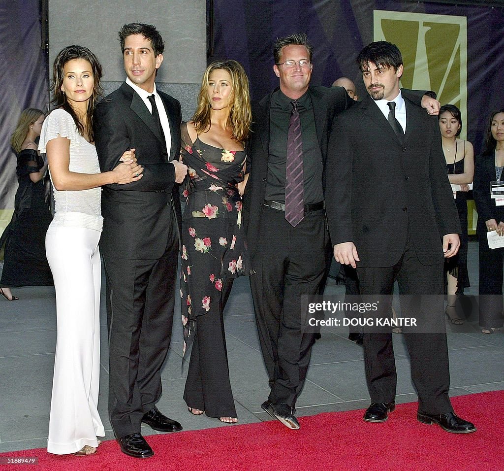 Five of the six cast members of the show "Friends"