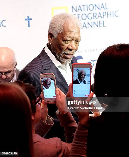 Morgan Freeman gets snapped by cameraphones while attending National Geographic "The Story Of God" With Morgan Freeman World Premiere at Jazz at...