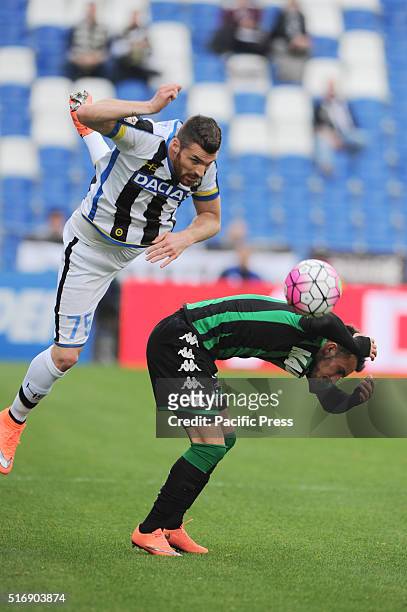 Thomas Heurtaux Udinese defender of French nationality and Nicola Domenico Sansone Sassuolo forward fight for the ball during the Serie A football...