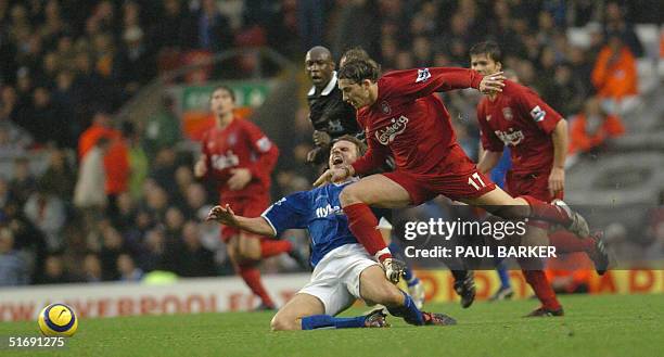 Liverpool's Josemi brings down Birmingham's Jesper Gronkjaer during today's Premiership clash at Anfield, Liverpool 06 November 2004. AFP PHOTO/PAUL...