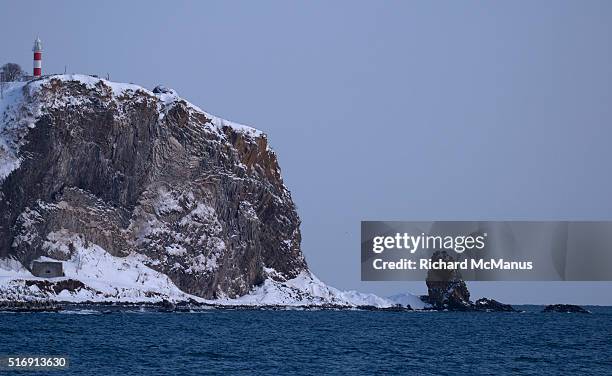 rausu harbour with lighthouse. - rausu harbor stock pictures, royalty-free photos & images