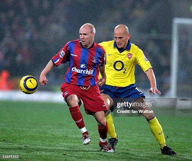 Pascal Cygan of Arsenal tries to tackle Andrew Johnson of Crystal Palace during the Barclaycard Premiership match between Crystal Palace and Arsenal...