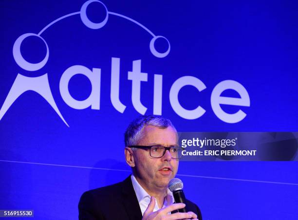Telecom Company Altice group Chief Operating Officer and CEO of SFR Michel Combes talks while presenting the group's business to business strategy in...