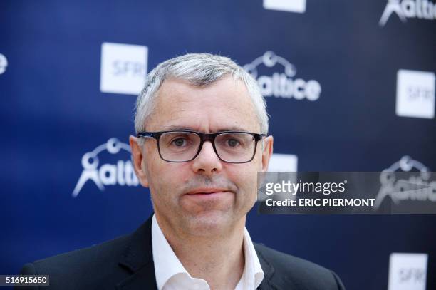 Telecom Company Altice group Chief Operating Officer and CEO of SFR Michel Combes poses prior to present the group's business to business strategy in...