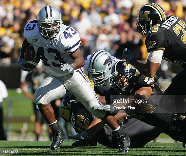 Darren Sproles of the Kansas State Wildcates breaks away from James Kinney of the Missouri Tigers to score a touchdown in the second quarter on...