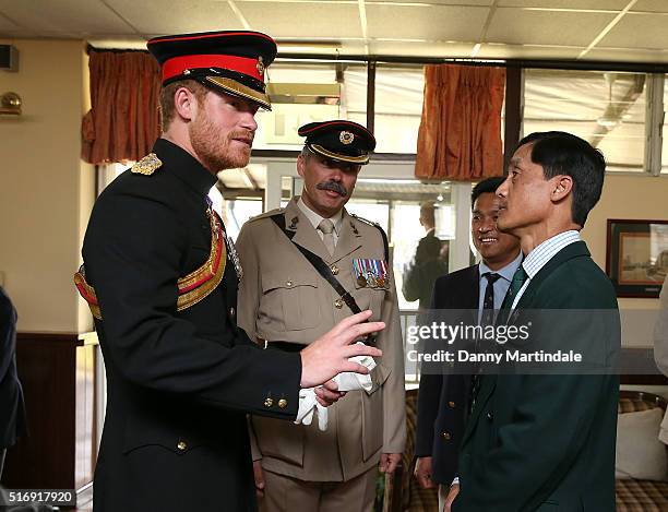 Prince Harry meets Bishnukunr Pun, a Gurkha who he took the Prince around Salisbury Plain when he was 6 years old with his father at British Gurkha...