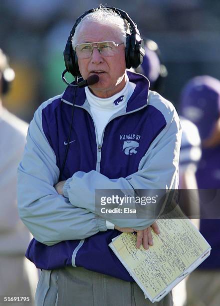 Head coach Bill Snyder of the Kansas State Wildcats watches from the sideline in the fourth quarter against the Missouri Tigers on November 6, 2004...