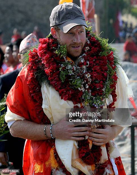 Prince Harry arrives at the Himalayan village of Okhari on day four of his visit to Nepal on March 22, 2016 in Bardia, Nepal. Prince Harry is on a...
