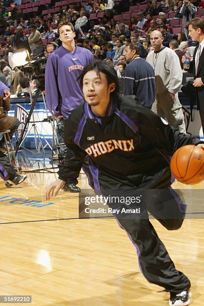 Yuta Tabuse of the Phoenix Suns warms up before their game against the New Jersey Nets on November 6, 2004 at Continental Airlines Arena in East...