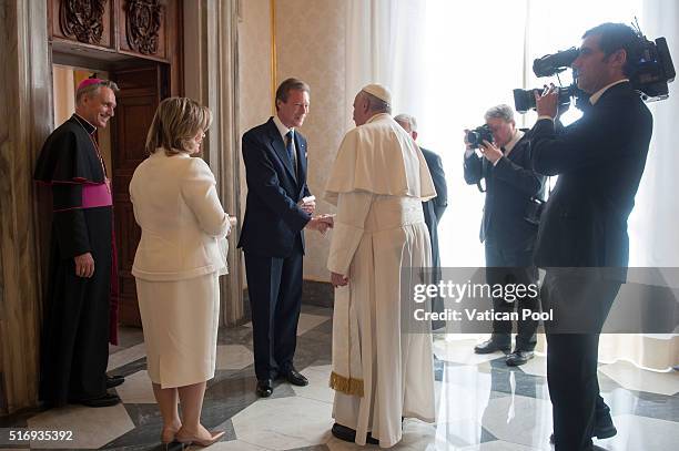 Pope Francis meets Grand Duchess Maria Teresa and Grand Duke Henri of Luxembourg at his private library in the Apostolic Palace on March 21, 2016 in...