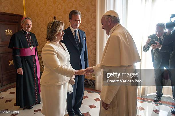 Pope Francis meets Grand Duchess Maria Teresa and Grand Duke Henri of Luxembourg at his private library in the Apostolic Palace on March 21, 2016 in...