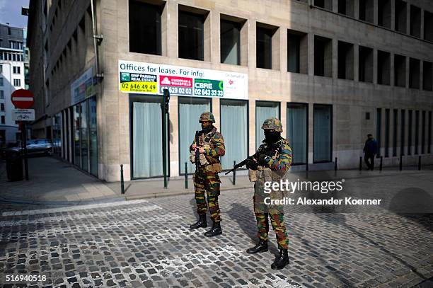 Soldiers patrol the scene at the Maelbeek metro station following todays attack on March 22, 2016 in Brussels, Belgium. At least 31 people are...