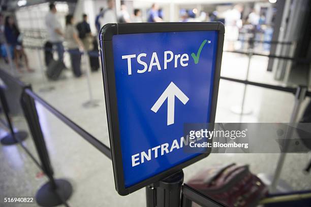 Transportation Security Administration pre-check sign stands at Dulles International Airport in Dulles, Virginia, U.S., on Wednesday, Aug. 19, 2015....