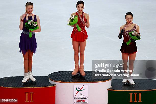 Silver medalist Maria Sotskova from Russia, gold medalist Marin Honda from Japan and bronce medalist Wakaba Higuchi from Japan pose for a pciture at...