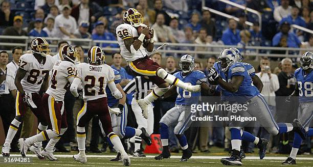Sean Taylor of the Washington Redskins recovers an onside kick late in the fourth quarter against the Detroit Lions at Ford Field November 7, 2004 in...