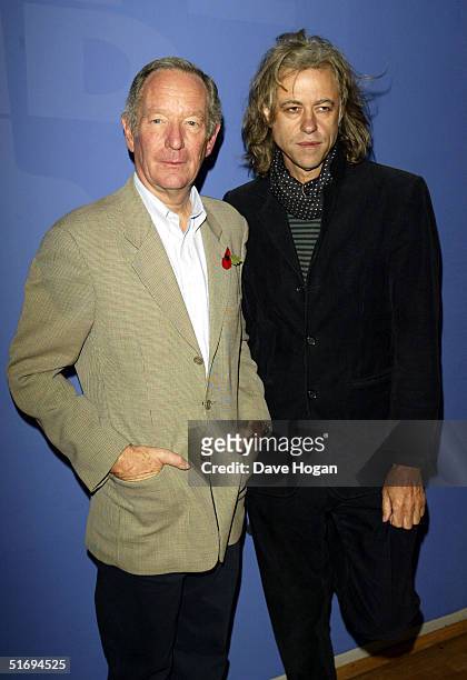 Presenter Michael Buerk and musician Sir Bob Geldof arrive at the premiere screening of the new four-disc DVD featuring 10 hours of footage from the...