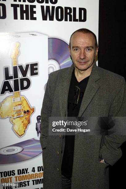 Musician Midge Ure arrives at the premiere screening of the new four-disc DVD featuring 10 hours of footage from the historic charity concert "Live...
