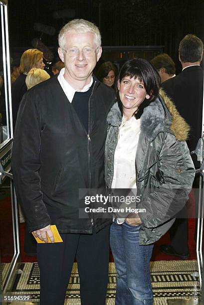 Director Richard Curtis and his wife Emma Freud arrive at the Premiere screening of the new four-disc DVD featuring 10 hours of footage from the...