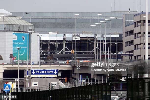 The glass front of the departure hall appears to be blown out after terrorist attacks at Zaventem Bruxelles International Airport on March 22, 2016...