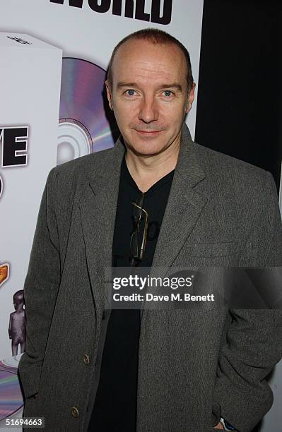 Musician Midge Ure arrives at the Premiere screening of the new four-disc DVD featuring 10 hours of footage from the historic charity concert "Live...