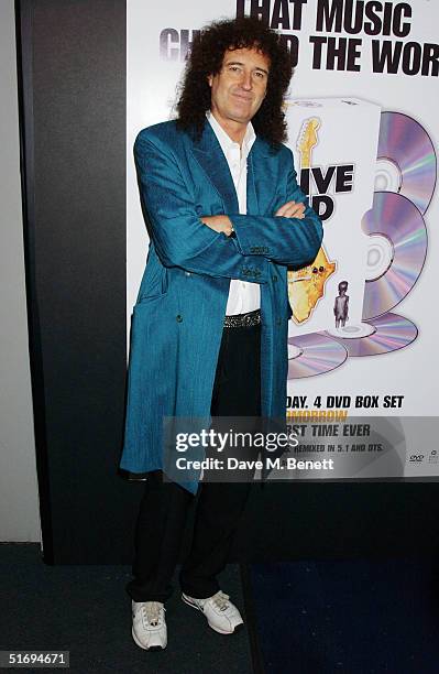 Musician Brian May arrives at the Premiere screening of the new four-disc DVD featuring 10 hours of footage from the historic charity concert "Live...