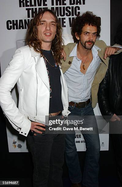 Justin Hawkins and Frankie Poullain arrive at the premiere screening of the new four-disc DVD featuring 10 hours of footage from the historic charity...