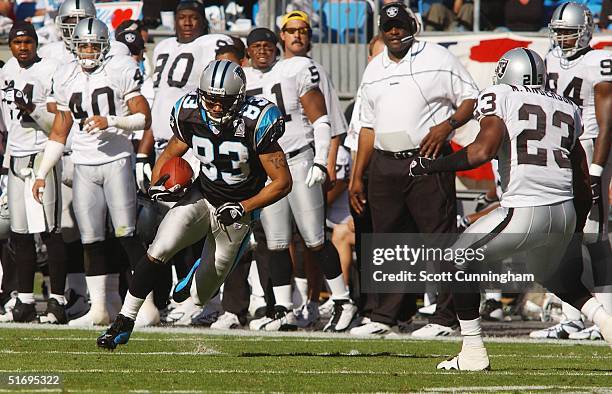 Keary Colbert of the Carolina Panthers runs against the Oakland Raiders at Bank of America Stadium on November 7, 2004 in Charlotte, North Carolina....