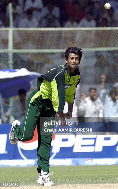 In this file photo taken 06 October 2004, Pakistani cricketer Shoaib Malik delivers a ball during the third match of tri-series between Pakistan and...