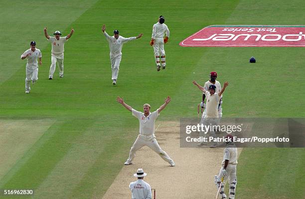 Andrew Flintoff of England gets the last wicket, Fidel Edwards of West Indies caught by Geraint Jones of England, to win the 1st Test between England...