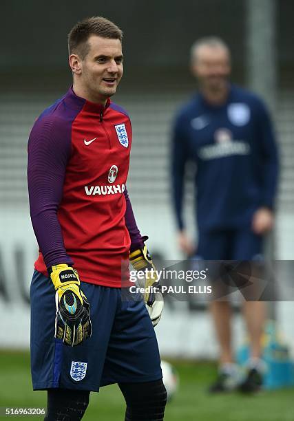 England goalkeeper Tom Heaton participates in a team training session at St George's Park in Burton-on-Trent, central England on March 22, 2016....