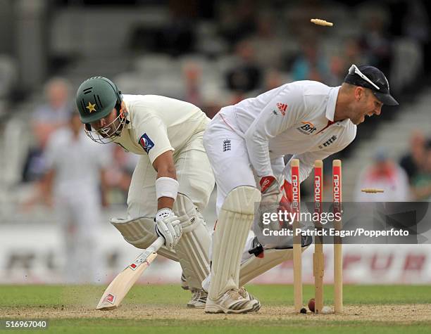 Umar Akmal of Pakistan is run out by a direct hit from Eoin Morgan of England during the 3rd Test between England and Pakistan at The Oval, London,...