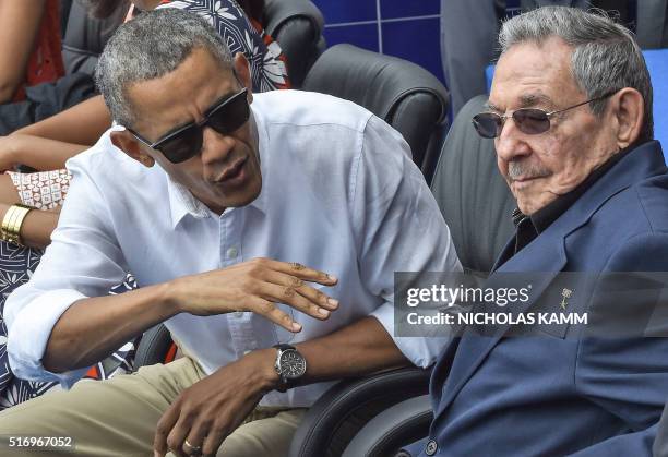 President Barack Obama speaks next to Cuban President Raul Castro during a Major League baseball exhibition game between the Tampa Bay Rays and the...