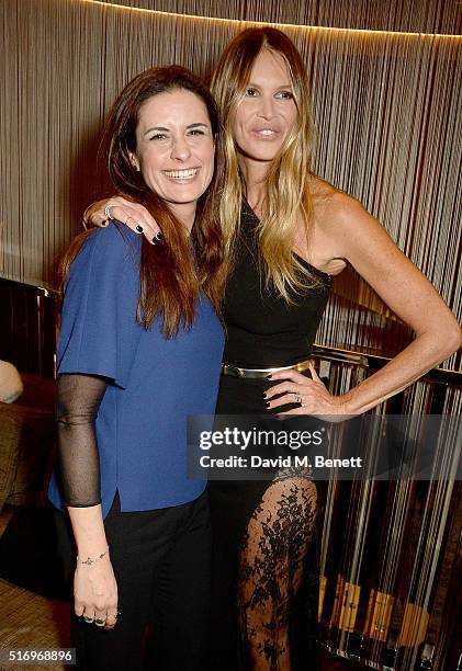 Livia Firth and Elle Macpherson attend the BFC/Vogue Designer Fashion Fund 2016 winners announcement at the Bulgari Hotel on March 22, 2016 in...