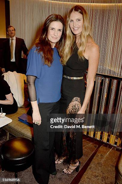 Livia Firth and Elle Macpherson attend the BFC/Vogue Designer Fashion Fund 2016 winners announcement at the Bulgari Hotel on March 22, 2016 in...