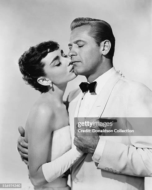 Actress Audrey Hepburn and actor William Holden pose for a publicity still for the Paramount Pictures film 'Sabrina' in 1954 in Los Angeles,...