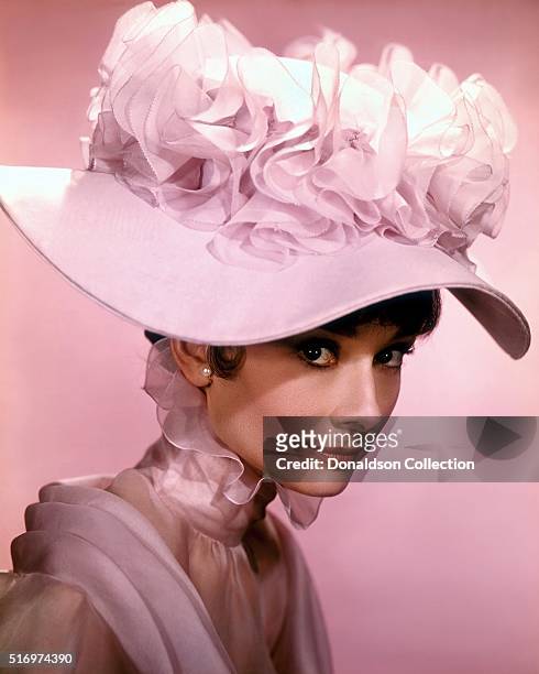 Actress Audrey Hepburn poses for a publicity still for the Warner Bros film 'My Fair Lady' in 1964 in Los Angeles, California.