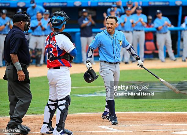 Cuban-Born Tampa Bay Rays Outfielder Dayron Varona is greeted by Cuban catcher Frank Camilo Morejon Reyes during game at the Estadio Latinoamericano...