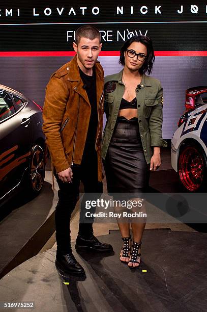 Demi Lovato and Nick Jonas attend the Honda Civic Tour Artists Announcement and Honda Civic North America Launch Event at the Garage on March 22,...