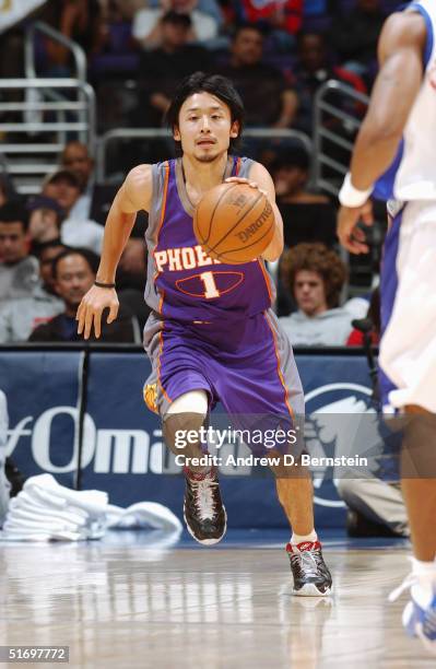 Yuta Tabuse of the Phoenix Suns moves the ball during the preseason game with the Los Angeles Clippers at Staples Center on October 28, 2004 in Los...