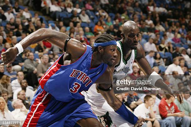 Ben Wallace of the Detroit Pistons covers Kevin Garnett of the Minnesota Timberwolves during the preseason game on October 29, 2004 at the Target...