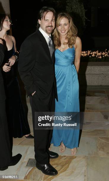 Jon Randall and Jessie Alexander arrive at the 52nd Annual BMI Country Awards November 8, 2004 in Nashville, Tennessee.